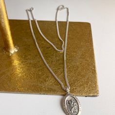 Sterling silver antiqued-finish St. Christopher medal oval pendant chain necklace. Saint Christopher is the patron saint of travelers + children! Pendant Length: 24mmPendant Width: 16mm Weight: 10.47 grams 925 Sterling Silver Purity Antiqued (blackened) 24" curb chain 2mm wide chain NO CLASP, simply slip over head (head must be smaller than 24") St Christopher Medal, St Christopher, Saint Christopher, Patron Saints, Oval Pendant, Antique Finish, Curb Chain, Chain Necklace, 925 Sterling Silver