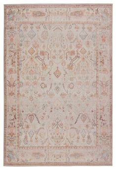 an antique style rug with various colors and patterns on the carpet, including pinks, browns