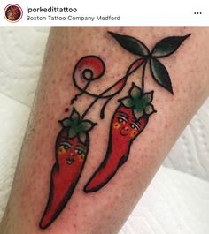 a tattoo with two chili peppers on it