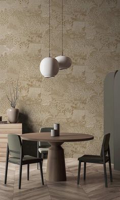 a dining room table and chairs in front of a wallpapered background