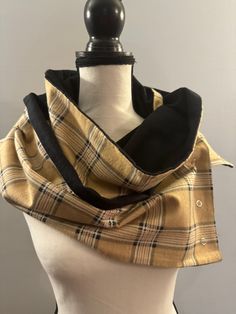 **Ready to Ship** Handmade soft 100% cotton flannel scarf with 4 metal snap buttons. Tan, white, and black plaid flannel scarf, black flannel on opposite side, with snap buttons to wear multiple ways! This scarf is designed to be worn so many ways and it's reversible!  Perfect for fall and winter! Makes a wonderful gift for yourself, a loved one, a Secret Santa or anyone who wants to be cozy! The finished size is approximately 10 inches wide and 72 inches in length, easy for wearing long or wrapped twice, buttoned or unbuttoned! This scarf is: -Made of 100% soft cotton flannel in a smoke-free environment. -Scarf can be worn multiple ways to suit your comfort and style. -Machine wash delicate cold. Tumble-dry low. *Fabric may shrink up to in the dryer* recommend hanging to dry to prevent fa Denim Wristlet, Flannel Scarves, Black Flannel, Button Scarf, Grey Plaid, Black Plaid, Plaid Flannel, Cotton Flannel, Secret Santa