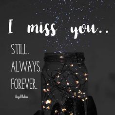 a mason jar with lights in it that says, i miss you still always forever