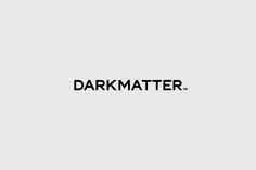 the dark matter logo is shown in black on a white background, and it appears to be part of an advertisement