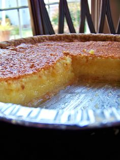 a pie sitting on top of a metal pan