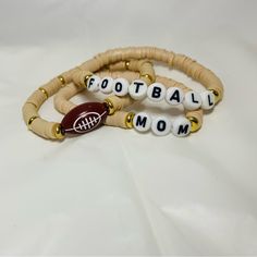 The Perfect Set For The Proud Football Mama In Your Life. Set Of 3 Bracelets Made With Polymer Clay Beads On Elastic Stretch Cord. Never Worn. Cute Bracelet Stacks, Bracelets Business, Homemade Bracelets, Bracelets Set, Football Mom, Cute Bracelets, Polymer Clay Beads, Cream And Gold, Clay Beads