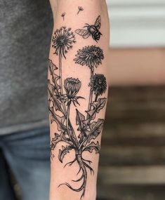 Original design by Lauren Damon at Riverside Tattoo Parlor in ThunderboltGeorgiaFollow her on IG @laurendamon.tattoo or the shop @riversidetattooparlor Nature Bicep Tattoo, Dandelion Tattoo With Roots, Cottagecore Tattoos Sleeve, Dandelion Sleeve Tattoo, Nature Skull Tattoo, Forearm Tattoos Woman, Nature Patchwork Tattoo Sleeve, Women Upper Arm Tattoo, Weeds Tattoo