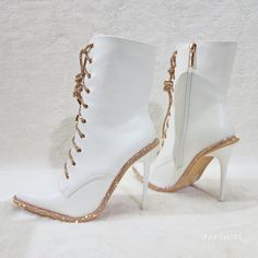 Brand New White Vegan Leather Upper Rose Gold Trim On Tongue & Footbed. Adjustable Rhinestone Capped Laces Lace Up The Front Slim Stilettos Heels Stunning Sparkle & Soo Delightful To Look At. White High Ankle Boots For Party, White Embellished Spring Boots, White Rhinestone Boots For Spring, White Embellished Boots With Pointed Toe, White Ankle Boot Heels For Party, White Ankle Boots For Parties, Glamorous White Embellished Boots, Glamorous White Boots For Spring, Glamorous White Spring Boots