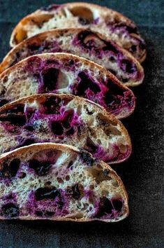 several slices of bread with blueberries on them