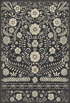 an ornate black and white pattern with flowers