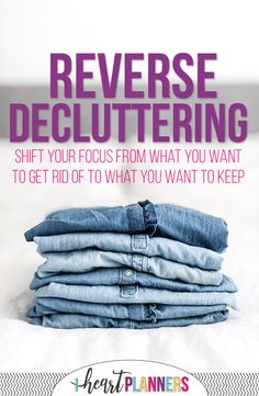 a stack of blue jeans with the words reverse decluttering on it in purple