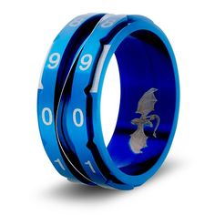 a blue ring with an image of a dragon on the inside and numbers in the outside