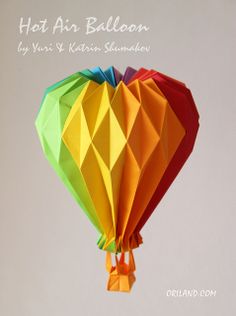 an origami hot air balloon in the shape of a heart