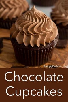 chocolate cupcakes with frosting on top sitting on a cutting board next to the words, chocolate cupcakes