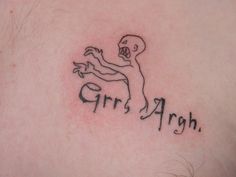 a person with a tattoo on their chest that says girls argh