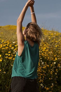 Turn up the tempo in this featherlight tank, with a sweat-wicking finish and a relaxed silhouette that brings a breath of fresh air to your every move. **Fit:** Relaxed fit; arced hem with deep side slits, crew neck **Features:** Airy, sweat-wicking fabrication, four-way stretch fabric that moves with you, relaxed silhouette **Why We ❤ It:** Easy to lounge in, easy to move in, this top keeps you cool and comfortable all day long. | Tempo Tank Top by FP Movement at Free People, Ivy, M Free People Tank Top, Sweaty Workouts, Boho Shops, Spring 2025, A Breath Of Fresh Air, Curvy Dress, Breath Of Fresh Air, Fp Movement, Move In