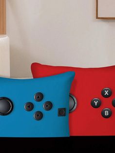 two red and blue pillows with buttons on them