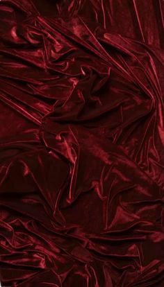 the fabric is very dark red and it looks like something out of an old book