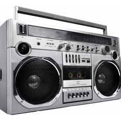 an old fashioned boombox with speakers on it's front and side panels, is shown