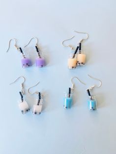 These earrings are super realistic and cute! They are absolutely perfect for boba tea lovers! And the little bottles are actually made of real glass! But don't worry they are super lightweight which is surprising right?  - hypoallergenic and nickel and lead free metal - Cute and functional + lightweight  - make a great gift - come in a variety of colors - come with rubber backings These would make such a cute gift for someone! These earrings are handmade in my little home studio and are packaged Necklace Pink Boba, Boba Tea Jewelry, Blue Boba Earrings, Liquid Boba Keychain, Tea Earrings, Cat Boba Keychain, Boba Milk Tea, Boba Milk, Boba Tea