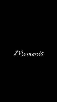 a black background with the word moments written in white ink on it's left side