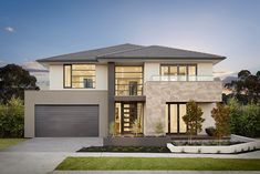 a two story house with an attached garage