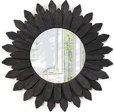 a mirror that is on top of a wall