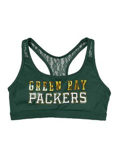 the green bay packers women's sports bra top is shown in black and gold