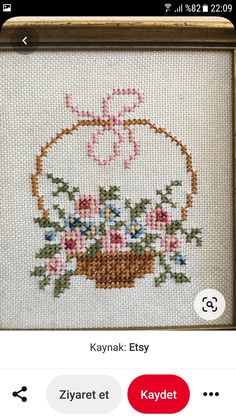 the cross stitch pattern is displayed on an iphone screen, and it's not in use