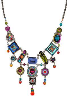 This intricately embellished mosaic jewelry is inset with a combination of Austrian Swarovski crystals and Czech glass beads. Iridescent and colorful. Oranges, pinks and purples. Lobster style clasps Oxidized silver plate over brass Necklace is 16" Pendant measures 1/2" square with a span of 6" 8300-MC La Dolce Vita Collection Firefly Jewelry specializes in elegant designs, innovative colors mixes and meticulous workmanship. Firefly uses filigree findings made from vintage molds, which give th Firefly Jewelry, Vintage Molds, Czech Jewelry, Jewelry Assemblage, Pink Circle, Weird Jewelry, Jewelry Repurposed, Mosaic Jewelry, Whimsical Jewelry