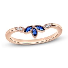 Breathtaking marquise-cut natural blue sapphires form a gentle curve in this sophisticated women's anniversary ring from the Kirk Kara Collection. Fashioned in 14K rose gold, dazzling diamond accents embellish milgrain-trimmed rosettes on either side of the center to complete the look. Anniversary Marquise Sapphire Ring, Marquise Sapphire Ring For Formal Occasions, Elegant Sapphire Marquise Diamond Ring, Sapphire Anniversary Band, Sapphire Anniversary, Sapphire Wedding Band, Jared The Galleria Of Jewelry, Natural Blue Sapphire, Sapphire Stone