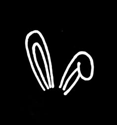 a black and white drawing of two scissors in the middle of each other's tails