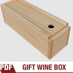 a wooden box with a hole in the middle and text that reads gift wine box