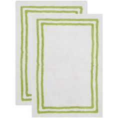 two green and white rugs sitting next to each other