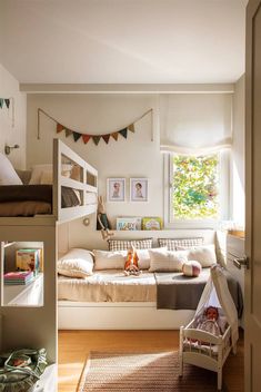 a bedroom with bunk beds and other items in it