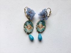 Rococo cherub ooak earrings, flower garland Cherub,baroque vintage angel  , Haskell elements Matching earrings on sale One of a kind  Miriam  Haskell elements Rococo boudoir style. All is built with vintage and rare pieces, take care of them, they will take care of you... One of a kind, from France. Gold Thread Embroidery, Vintage Angel, Flower Garland, Miriam Haskell, Earrings Flower, Thread Embroidery, Gold Thread, Flower Garlands, Gold Threads