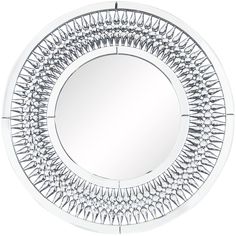 a round mirror with spikes on it