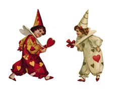 two children dressed in costumes with hearts on their hands and one holding a heart shaped object