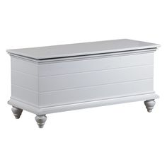 a white chest with two legs and a lid on the top, sitting against a white background