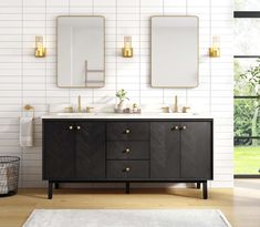 a bathroom with two sinks, mirrors and a rug in front of the sink area