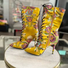 Brand New Never Worn Trendy Yellow Winter Boots, Gold High Heel Summer Boots, Yellow Round Toe Heeled Boots For Fall, Spring Ankle-high Lace-up Boots, Fitted Ankle-high Lace-up Boots For Spring, Yellow Fitted Boots With Round Toe, Yellow Pointed Toe Boots For Summer, Yellow Ankle-high Spring Boots, Multicolor Floral Print Boots For Summer