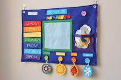 a bulletin board with magnets attached to the front and back of it that says today is tuesday