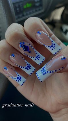 nail inspo Blue Tequila Nails, White Nails Blue Gems, Blue And White Tequila Bottle Nails, Clase Azul Almond Nails, Royal Blue Gem Nails, Azul Nails Ideas, Blue And White Nails Square, Pink Clase Azul Nails, Blue N White Nails