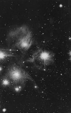 black and white photograph of stars in the sky