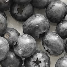 some blueberries are sitting on a table