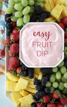 an easy fruit dip with berries, pineapples and grapes