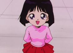 a cartoon girl with black hair and big eyes wearing a pink shirt and red skirt