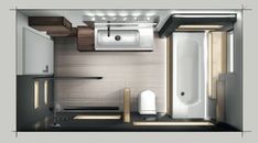 an overhead view of a small bathroom with sink, toilet and bathtub in it