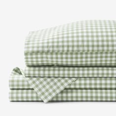 the green and white checkered sheets are folded on top of each other