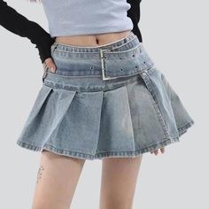 Introducing our ultra mini pleated denim skirt from the 2023 Summer Collection ââ‚?a timeless nod to the '90s. with a modern twist!Why It's Your Next Summer StapleThis 90s-inspired skirt reflects a perfect balance of modern fashion and nostalgia. With its lower-waisted silhouette. light wash. and subtle pleats. you'll add a touch of edginess to any ensemble. Plus. it's made with premium quality denim for a elongated-lasting wardrobe staple.Key Highlights: Nostalgic Vibes: A tribute to the iconic Edgy High-waisted Pleated Bottoms, Y2k Style Mini Denim Skirt For Fall, Y2k Style Fall Mini Denim Skirt, Y2k Mini Denim Skirt For Fall, Fitted Punk Denim Skirt, High-waisted Skort For Spring Streetwear, Y2k Style Skort For Streetwear In Spring, Trendy High-waist Skort For Streetwear, Trendy High Waist Skort For Streetwear