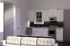 a living room and kitchen area with white furniture